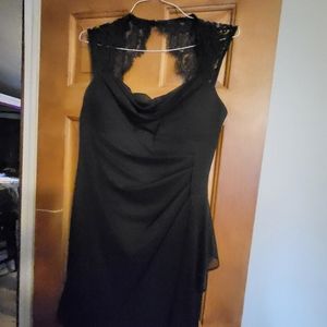 Womans black cocktail dress in size 14